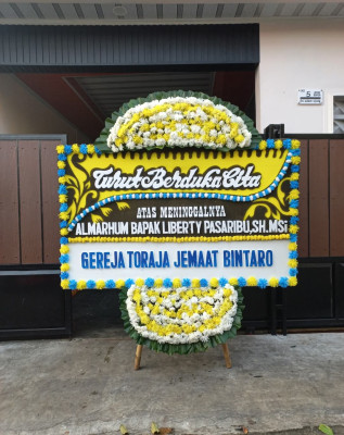 Papan Bunga Duka di Cariu